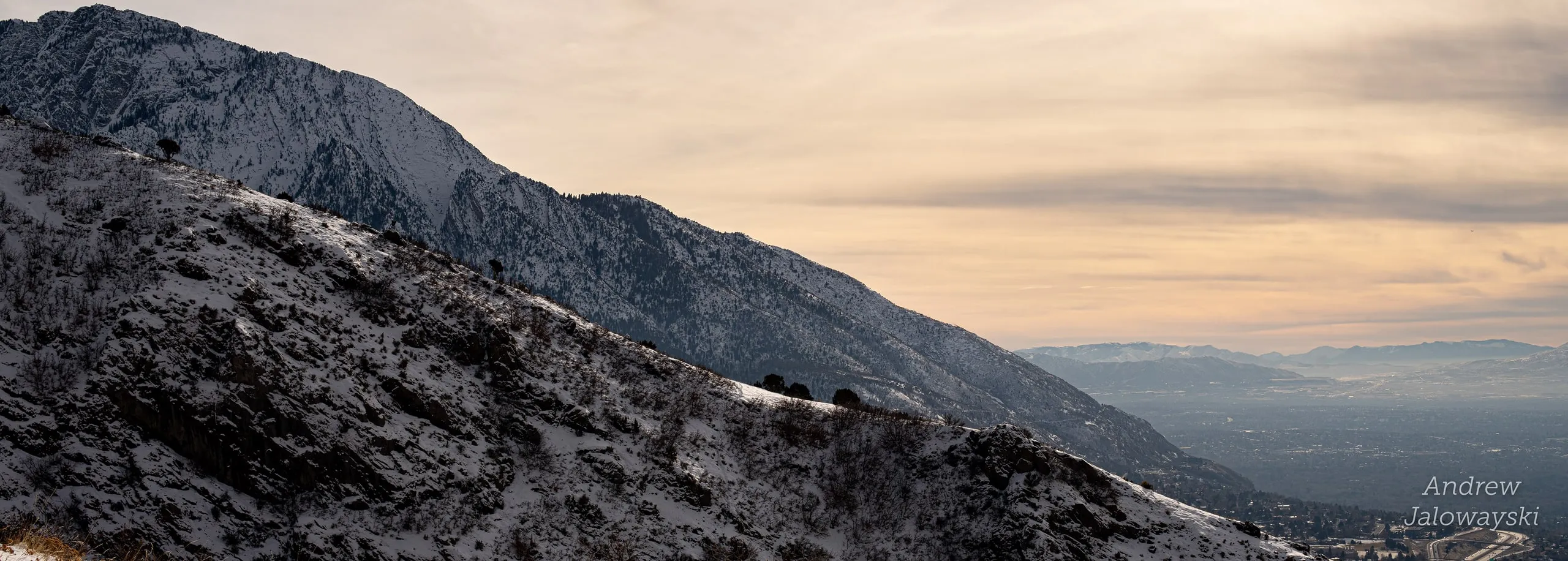 Mountain ridges fading into haze over the Salt Lake valley